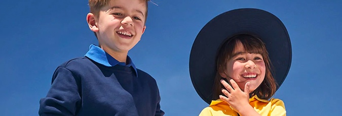 Target kids Young boy and girl smiling wearing school uniform