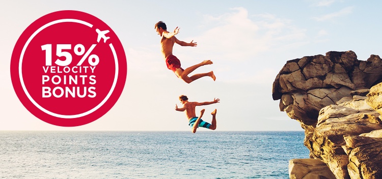Kids jumping off a rock into the ocean with a 15% Velocity points bonus icon over the top