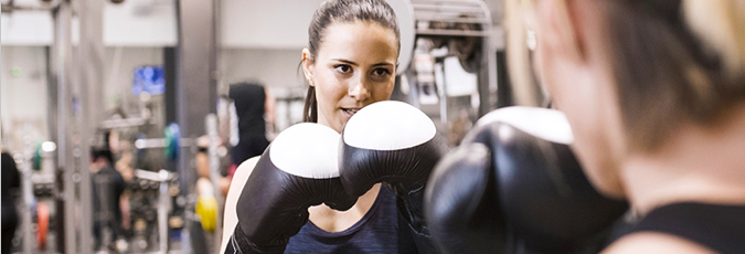 Two women doing boxing training