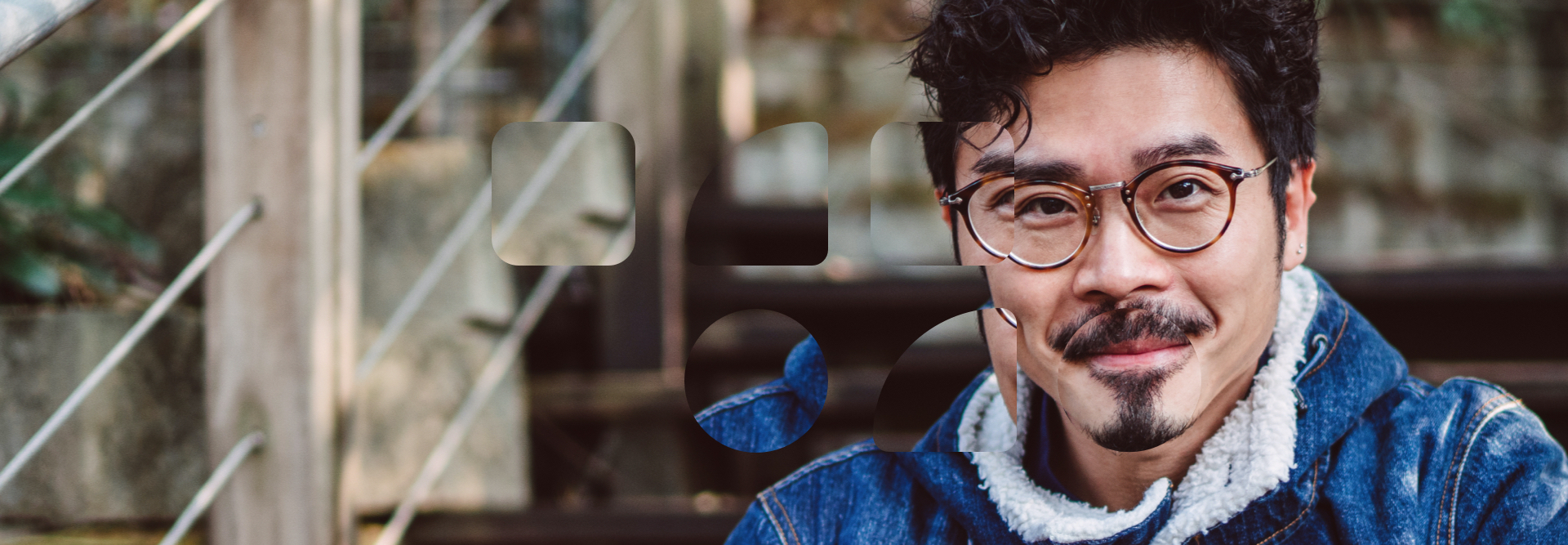 Guys with glasses checking his phone
