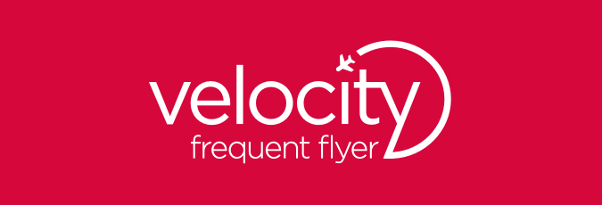 Velocity Frequent Flyer Velocity Frequent Flyer logo on a red background
