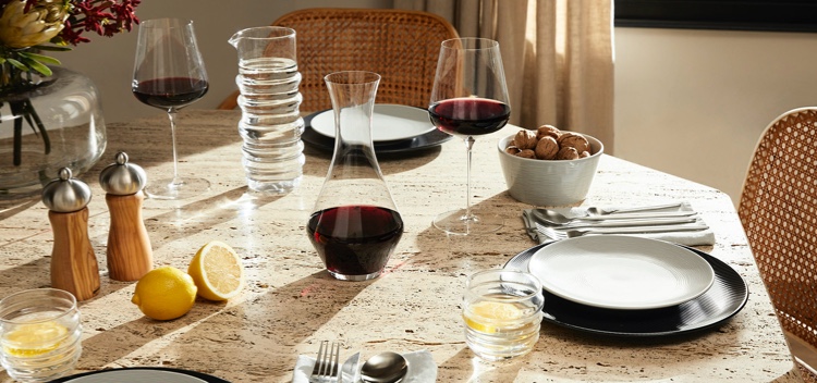 A range of dining and homeware products set on a dining table