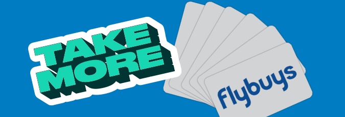 Boost your points stash A set of Flybuys cards against a blue background with the text "Take More"