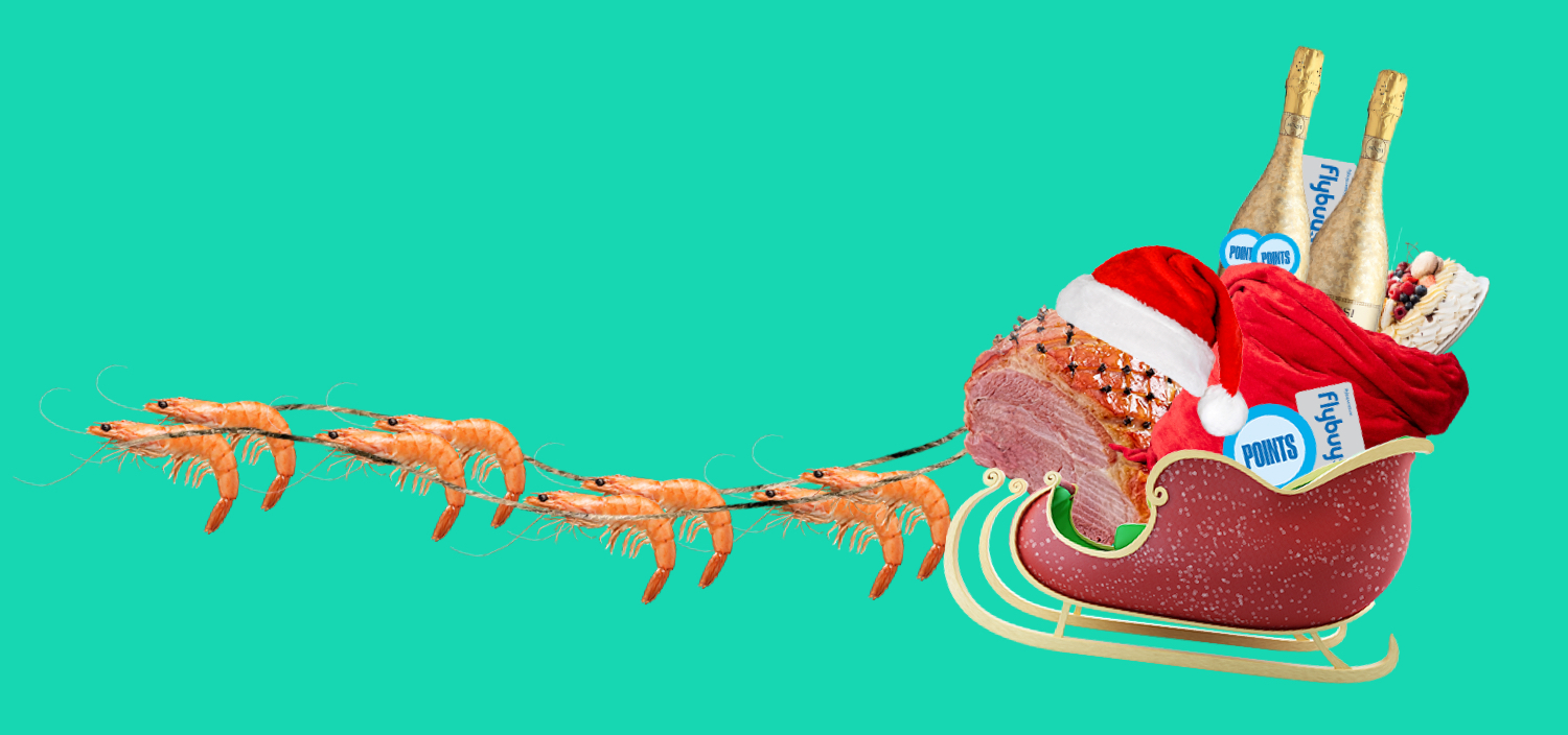 A Christmas Ham in a red hoodie on a sled pulled by prawns