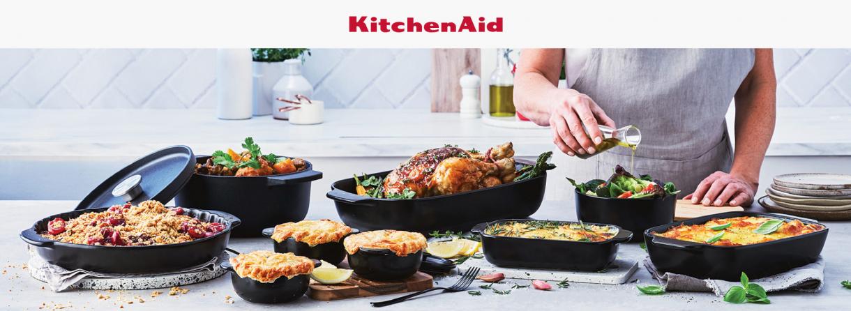 A range of KitchenAid kitchen products on a kitchen table