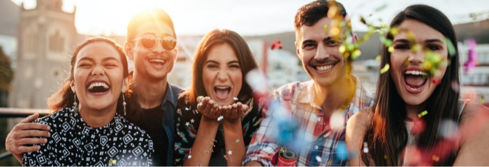 Score up to 90,000 bonus points Image of a group of friends, happily enjoying time together.