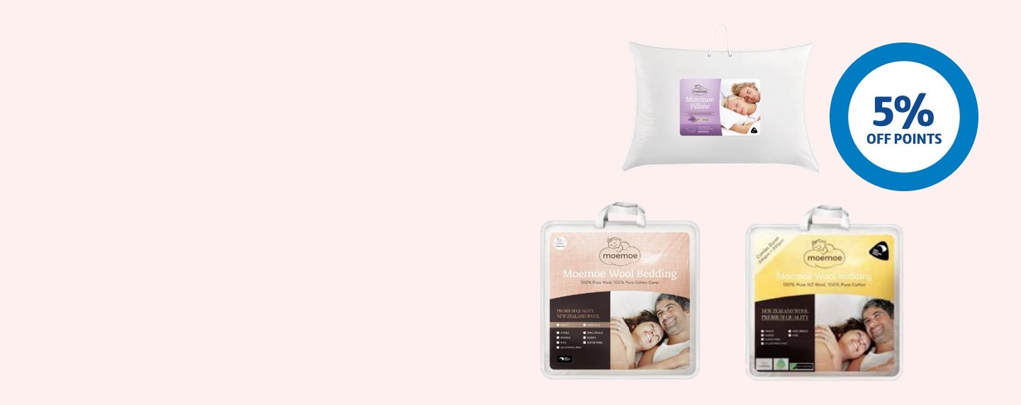 Moemoe pillows and bedding next to a 5% off points ring