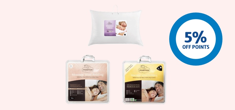 Moemoe pillows and bedding next to a 5% off points ring