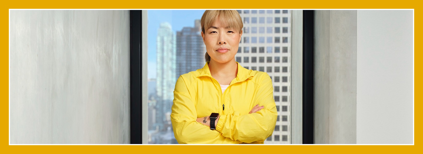 Flybuys' top 10 member Anna in sports gear with arms folded