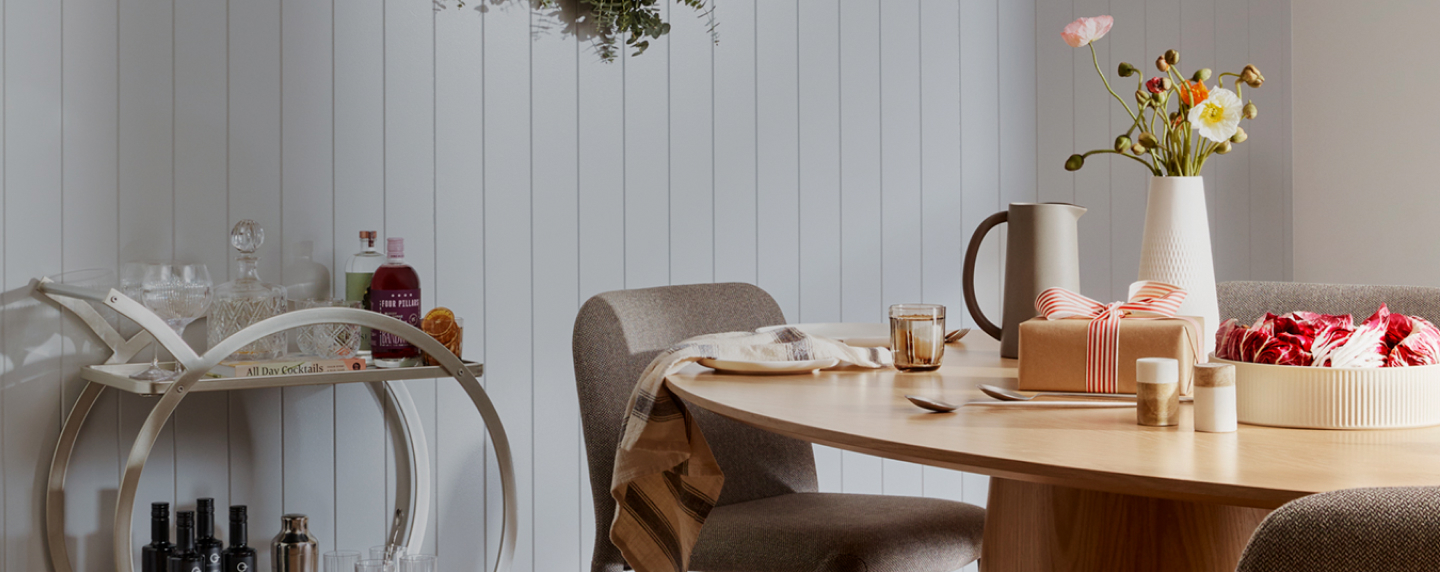 Table seating with products from the Flybuys Rewards Store