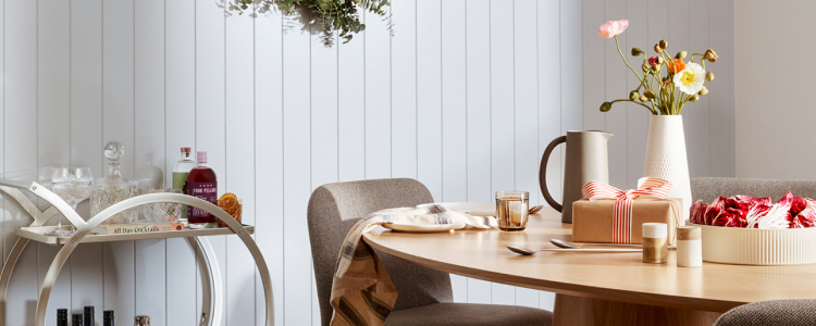 Table seating with products from the Flybuys Rewards Store