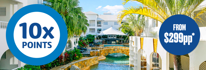 Discover paradise with Flybuys travel Mantra PortSea Port Douglas lagoon bar with roundels saying '10x points' , 'From $299pp*'