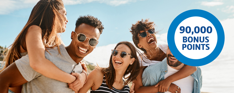 Smiling group of friends and 90,000 bonus points roundel