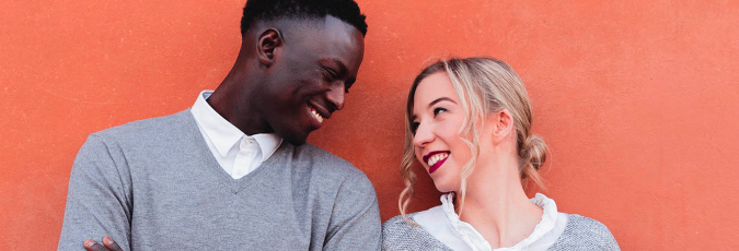 Smiling couple looking into each other's eyes