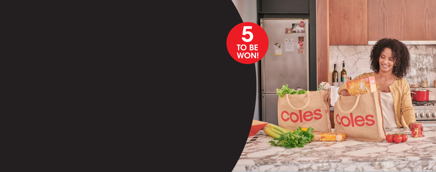 Women unpacking Coles groceries in kitchen and roundel '5 to be won!'