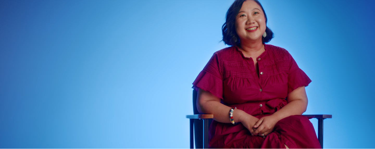 Flybuys 50 top 10 member Sarah sitting on chair
