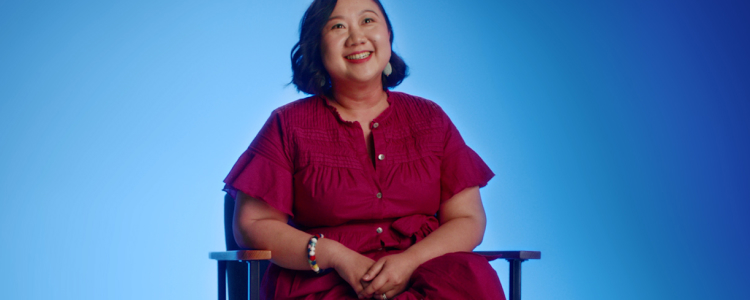 Flybuys 50 top 10 member Sarah sitting on chair