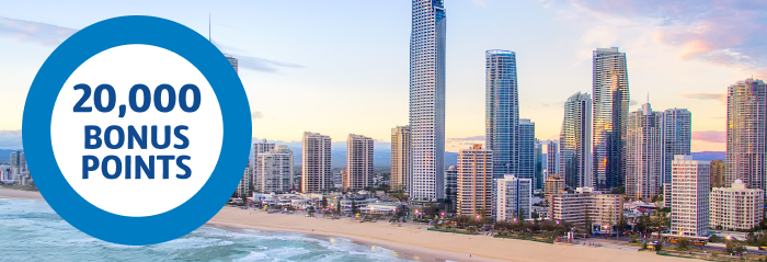Collect 20,000 bonus points on a Gold Coast escape Gold coast background and 20,000 bonus roundel