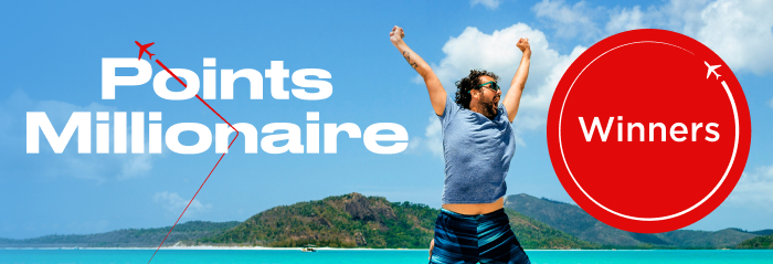 Man on beach leaping in air by 'winners' roundel and 'point millionaire' text
