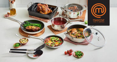 Food cooked in MasterChef cookware displayed on table