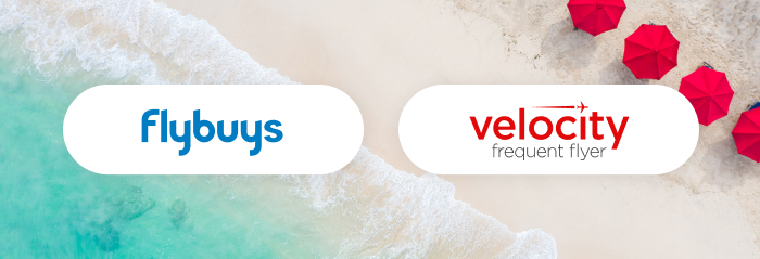 How to fly faster with Flybuys and Velocity Flybuys and velocity frequent flyer logos on beach front with red umbrellas