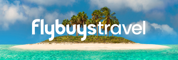 Flybuys travel Flybuys Travel white logo over a desert island with green palm trees and aquamarine sea.