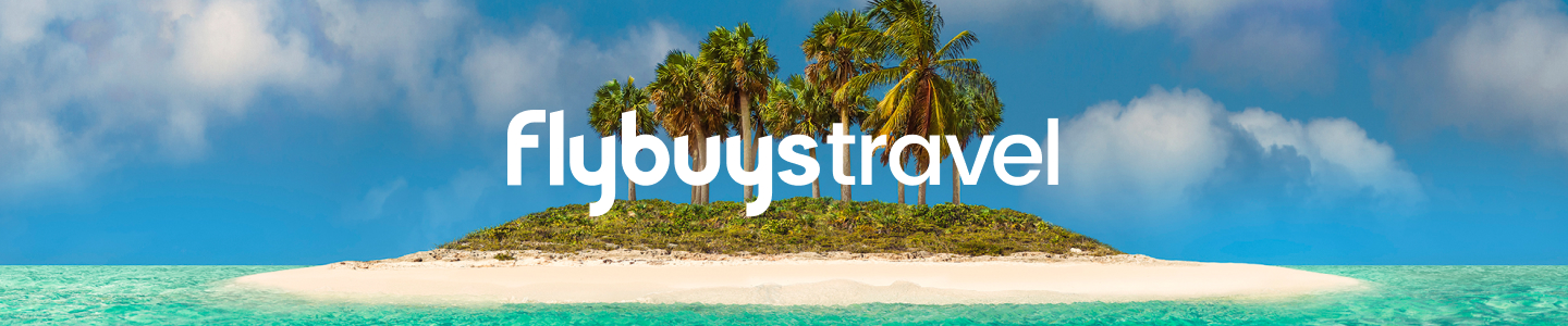 Flybuys Travel white logo over a desert island with green palm trees and aquamarine sea.   
