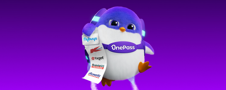 Onesie holds Flybuys card and docket displaying OnePass retailers
