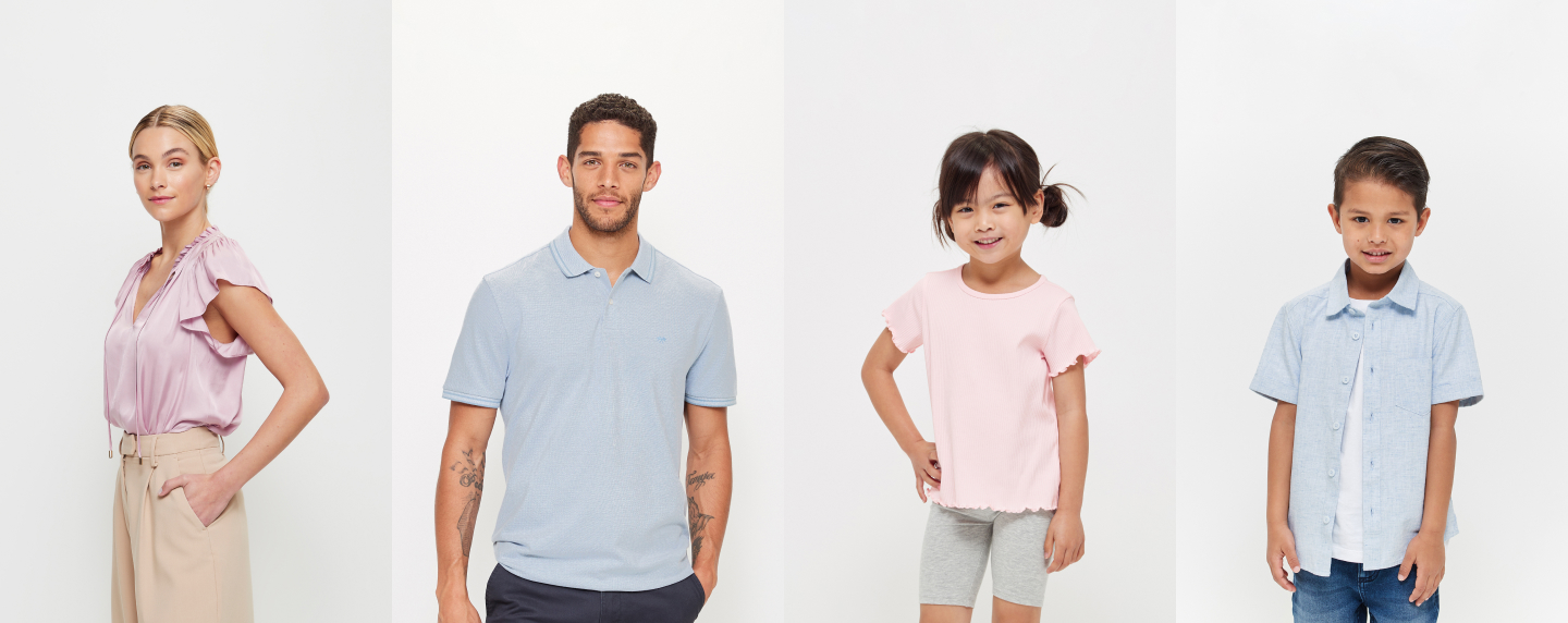 Women, man and two children posing for camera