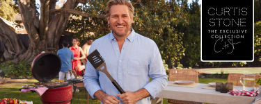 Free Curtis Stone BBQ pieces with BBQ credits Curtis Stone holding grill