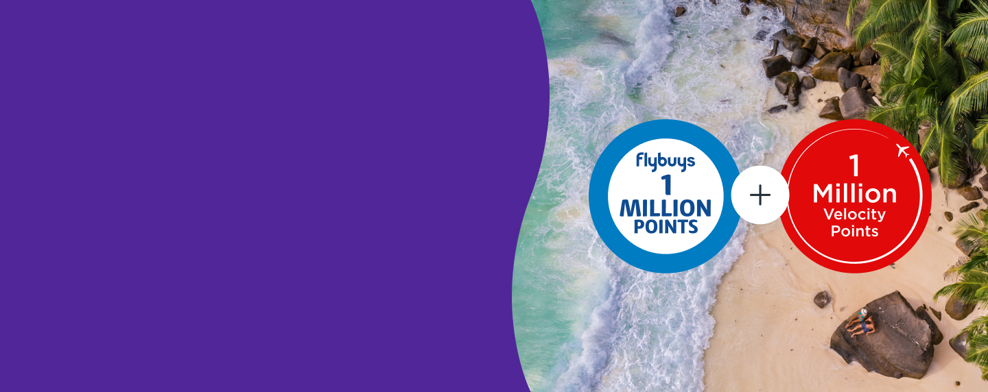 Aerial view of waves crashing against a beach with an overlay of the Flybuys 1 million points roundel and Velocity 1 million points roundel 