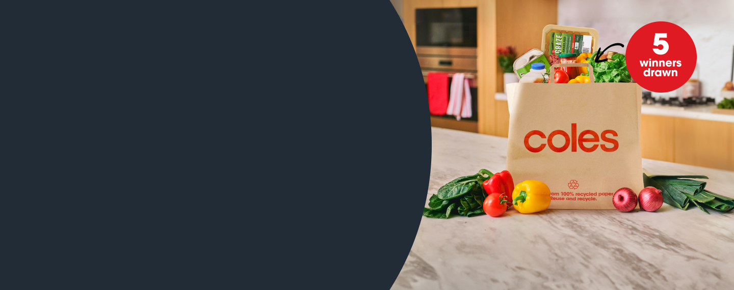 Full Coles shopping bag sitting on kitchen counter
