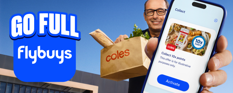 Smiling man holding a full Coles shopping bag holding an unactivated Coles Offers on his phone